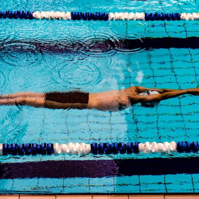 benefits of swimming, man swimming